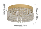 Modern gold crystal chandelier with integrated LED, sleek design, and shimmering prisms for luxury ambiance.
