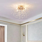 Ornate modern crystal chandelier with gold base, tassels, and multiple glass branches; semi-flush mount.