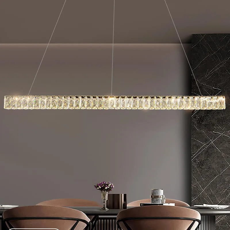 Maison Ornate Modern Crystal Chandelier features layered crystals and sleek metal in a sophisticated design.