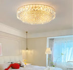 Modern LED Crystal Art Deco chandelier by Maison Ornate with gold accents and elegant design.