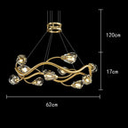 Curved gold chandelier with eight dimmable LED crystal glass pendants, suspended by wires.