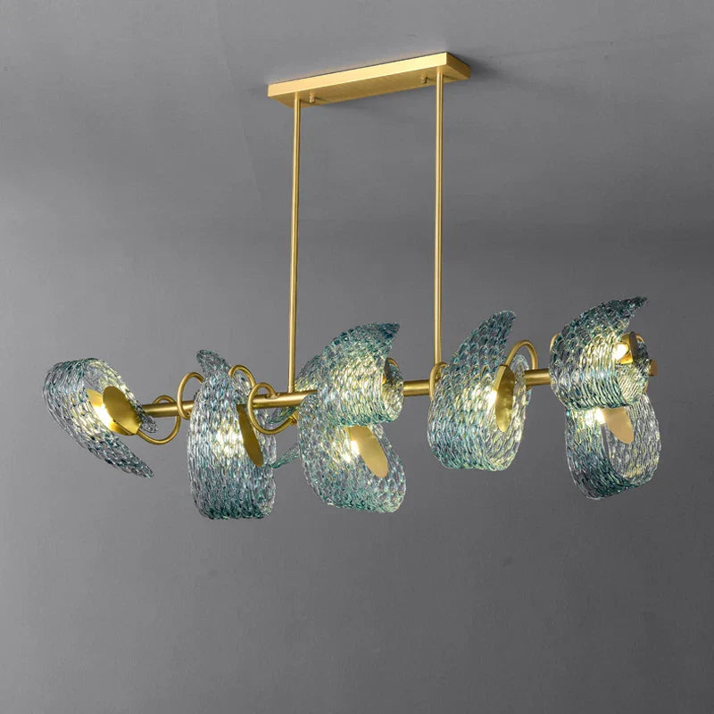 Maison Ornate LED chandelier with six blue-green crystal leaf lampshades on a rectangular base.