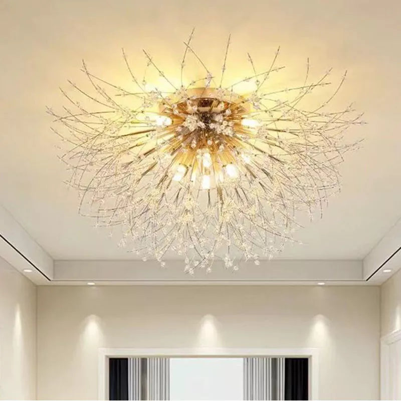 Ornate modern multi-head chandelier with gold accents, tassels, and sparkling crystal-adorned branches.