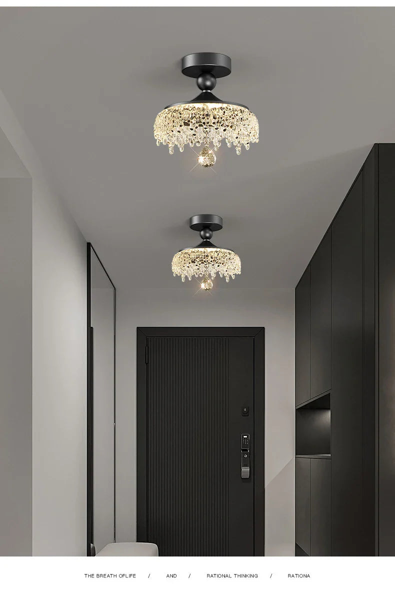 Two French Medieval Style Crystal Teardrop Chandeliers by Maison Ornate with sparkling crystal accents.