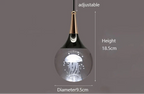 Maison Ornate Modern LED Crystal Chandelier with jellyfish design in glass sphere, integrated LED, adjustable height.