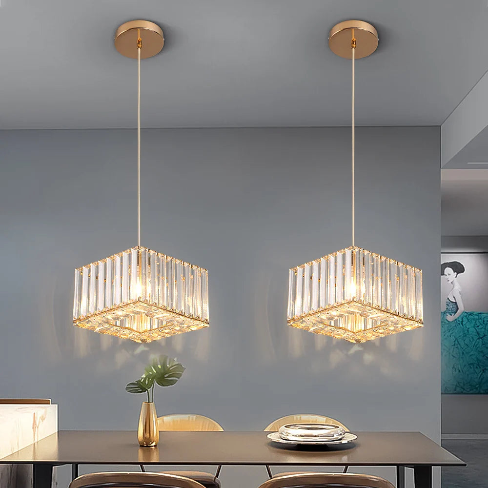 Pair of Art Deco crystal chandelier adjustable lights by Maison Ornate, elegant geometric design.