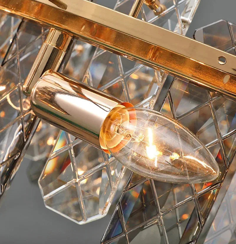 Maison Ornate Modern Crystal LED chandelier with gold candle bulb, faceted glass, and sparkling elegance.