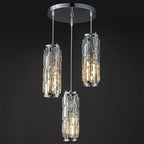 Maison Ornate black chrome chandelier with three cylindrical crystal-like glass lights on round mount.