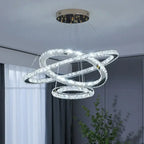 Maison Ornate chandelier with three intertwined LED rings and dimmable modern crystal pendants.
