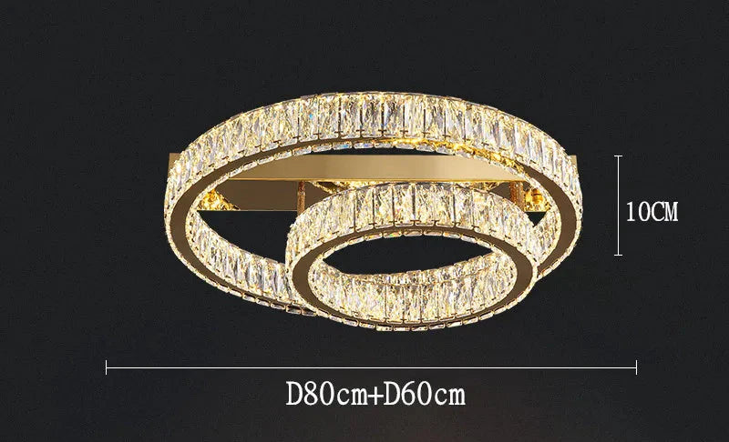Gold double-ring chandelier with sparkling crystals, 10 cm high, stainless steel modern design.