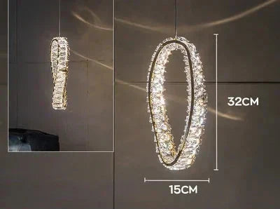 Elegant oval Modern LED Crystal Glass Chandelier, 32x15 cm, ceiling-suspended with a warm glow.