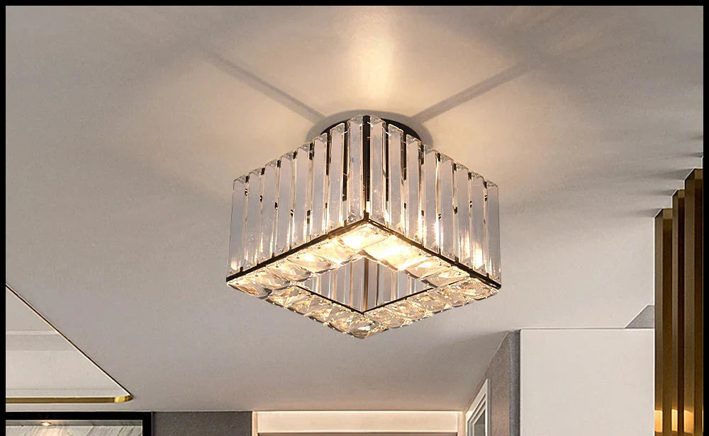 Art Deco chandelier with vertical crystal bars, metallic frame, adjustable lights, soft reflective glow.