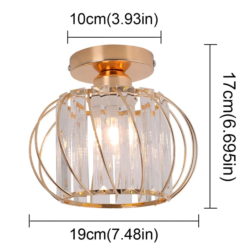 Gold Art Deco chandelier with clear vertical glass panels, round base, gold accents; 19cm wide.