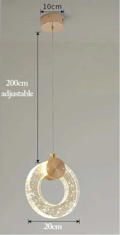 Gold base LED chandelier with glowing crystal ring, adjustable 200cm cord, modern Nordic design.
