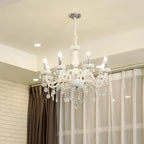 Maison Ornate Nordic Baroque crystal chandelier with curved tubes, candle bulbs, and hanging crystals.