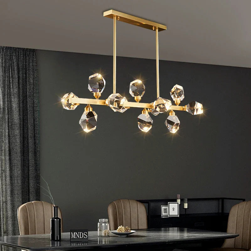 Maison Ornate Modern Glass Crystal Chandelier features brass structure and LED lighting. Contemporary, elegant ceiling fixture.