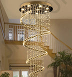 Maison Ornate Duplex Spiral Crystal Pendant Light features cascading crystals in an elegant, modern chandelier design.