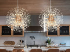 Pair of Maison Ornate Modern LED crystal iron chandeliers in firework-inspired design, product-focused view.