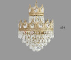 Maison Ornate Crystal Ball Chandelier with gold crown, clear prisms, and oval gems accents.