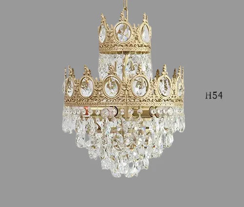 Maison Ornate Crystal Ball Chandelier with gold crown, clear prisms, and oval gems accents.