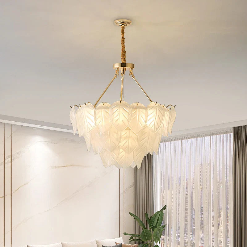 Maison Ornate Vintage Gold Crystal Chandelier with intricate gold frame and sparkling crystal accents.