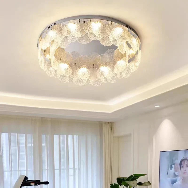 Maison Ornate Postmodern Chandelier with LED lights and leaf accents, emits a warm glow.