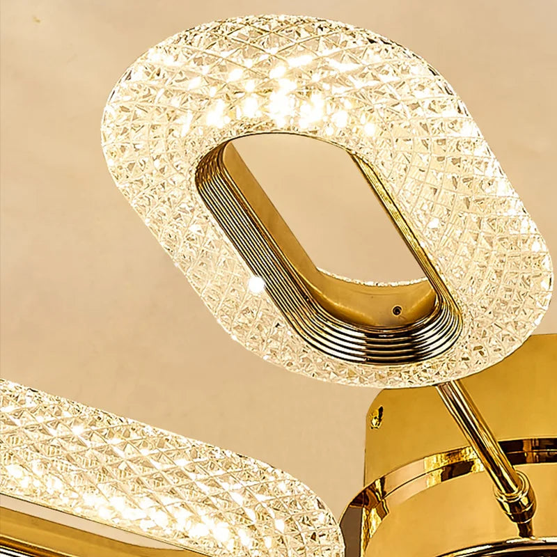 Close-up of Maison Ornate Post-Modern LED Crystal Chandelier with dual oval gold-edged crystal rings.