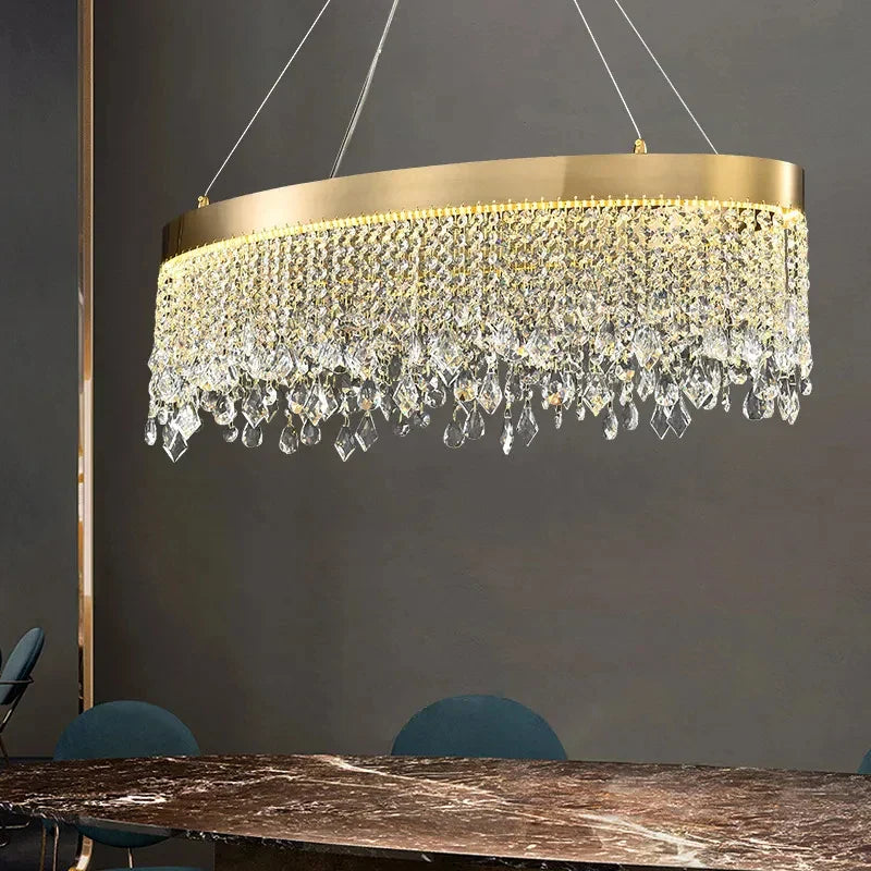 Maison Ornate Modern Crystal Chandelier features gold round pendants in an elegant, contemporary design.