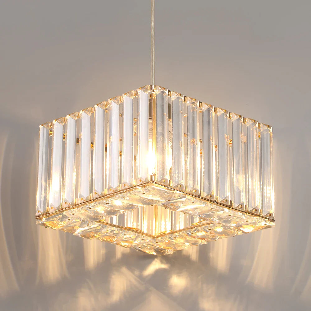 Art Deco crystal chandelier with square frame, vertical glass rods, gold accents, and adjustable rope.