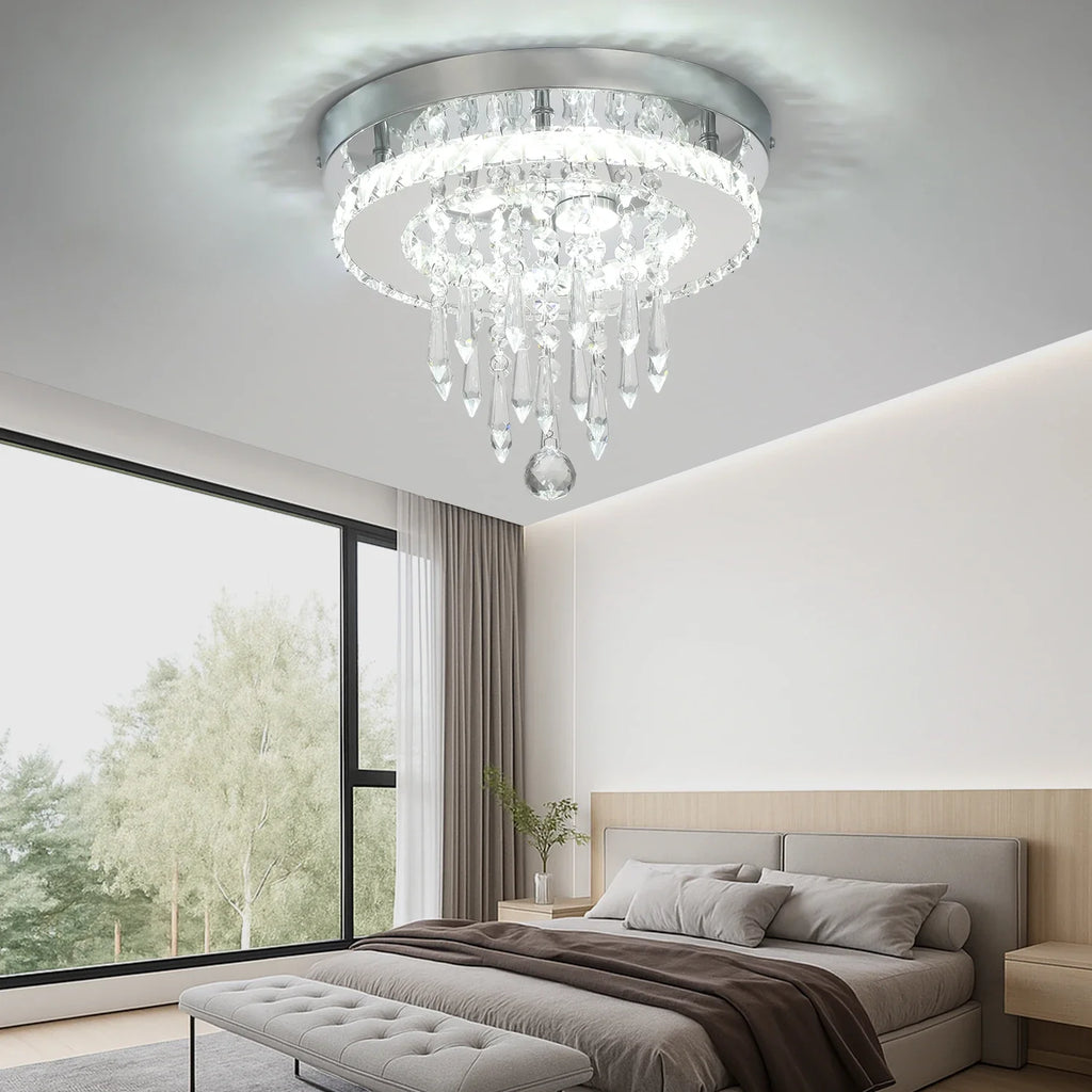 Maison Ornate Modern LED Crystal Bedroom Chandelier in stainless steel with hanging, bright pendants.