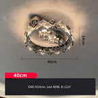 Modern stainless steel chandelier with crystal accents, 40cm wide, 14cm high, illuminates hallways elegantly.