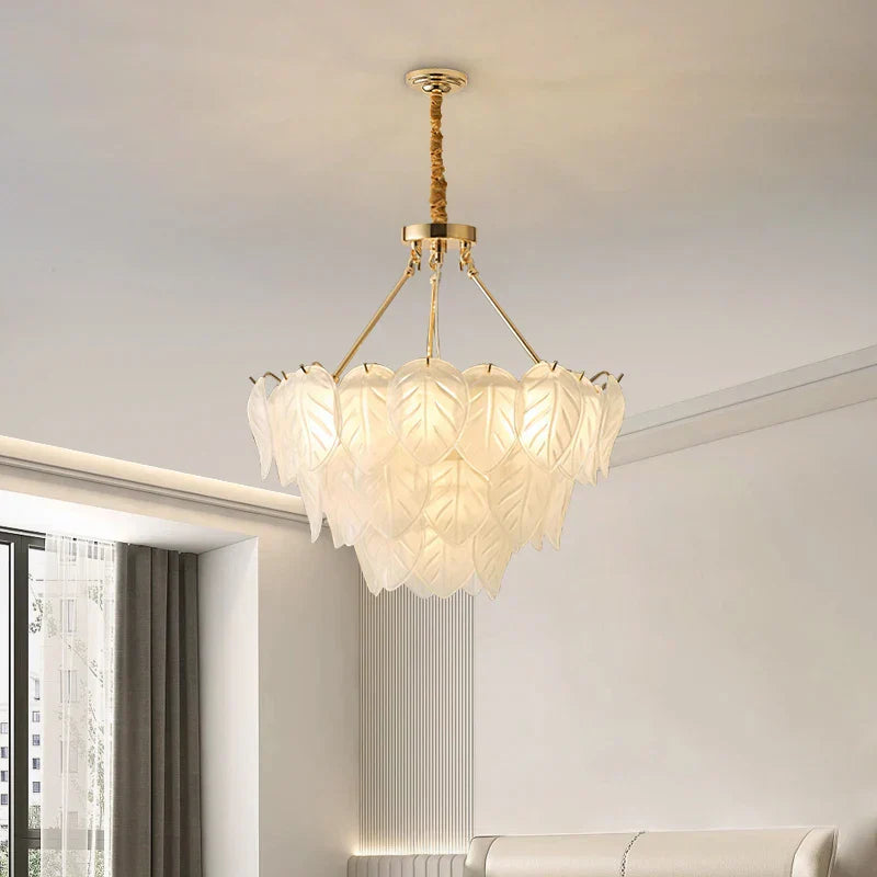 The Maison Ornate Vintage Gold Crystal Chandelier features intricate gold accents and cascading crystal details.