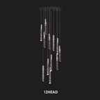 Modern crystal chandelier with chrome frame, twelve lights at varied heights from round black mount.