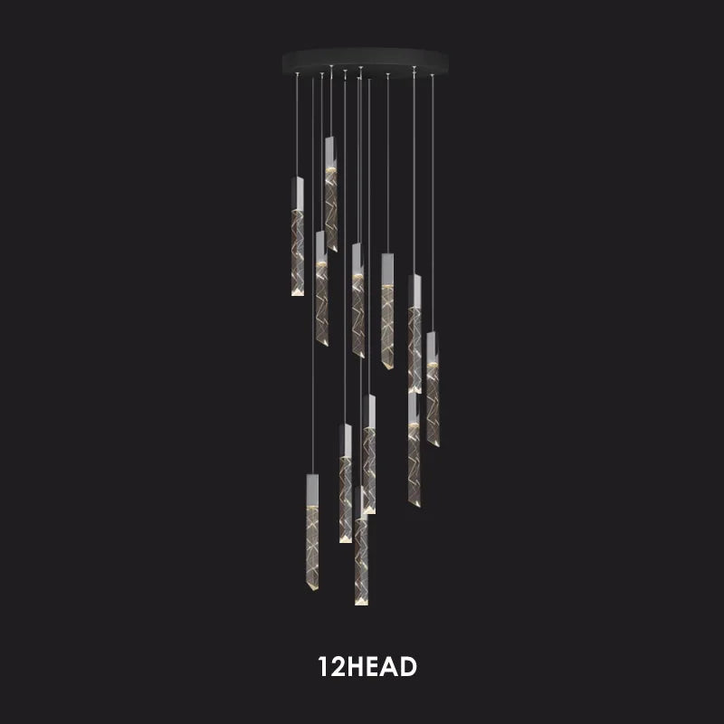 Modern crystal chandelier with chrome frame, twelve lights at varied heights from round black mount.