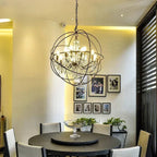 Maison Ornate American Style Industrial Crystal Birdcage Iron Chandelier in a striking metal orb.