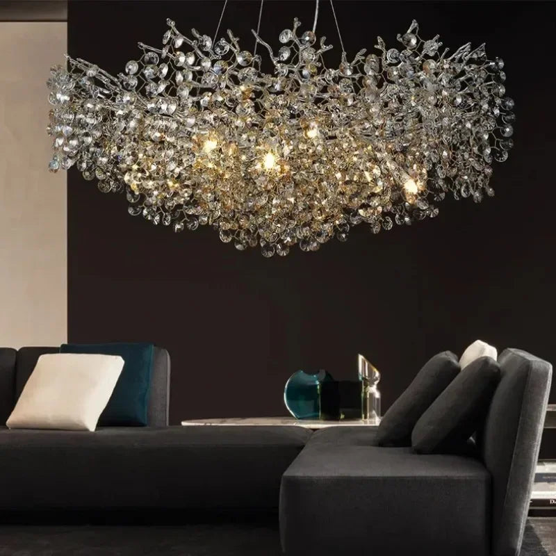 The Maison Ornate Elegant Contemporary Crystal Chandelier features LED remote control and sparkling crystal accents.