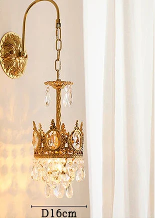 Ornate crystal ball chandelier with detailed design and dangling crystals, 16 cm diameter, wall-mounted.