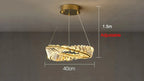Gold-based LED crystal chandelier with twisted ring, three-wire suspension, adjustable up to 1.5m.