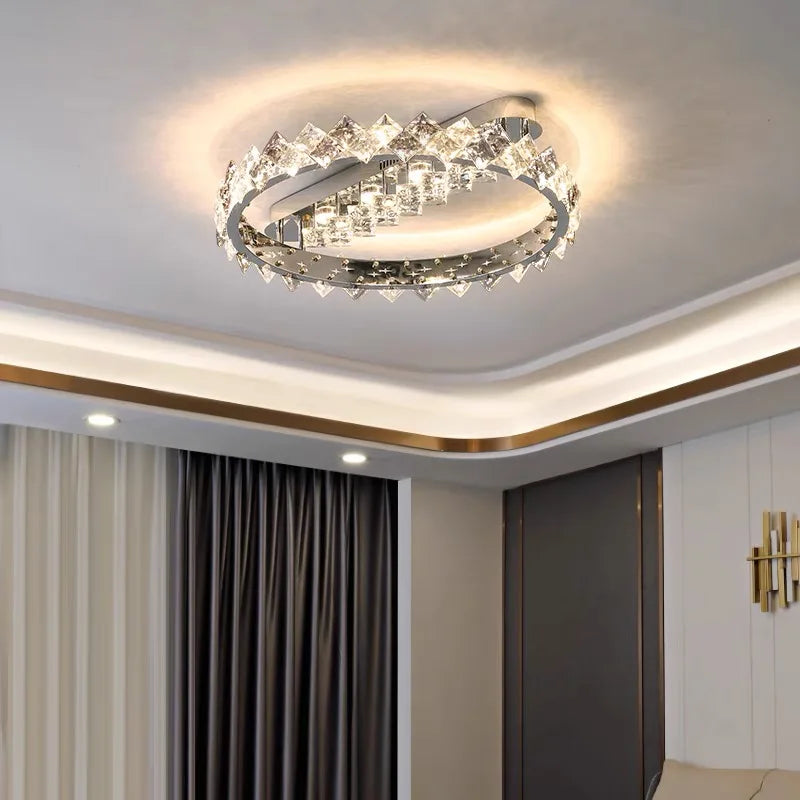 Maison Ornate’s stainless steel crystal chandelier: modern, circular shape emits a warm, elegant light.