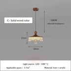 Ornate French medieval chandelier with wood-toned top, crystal drops, and adjustable wire for intimate spaces.