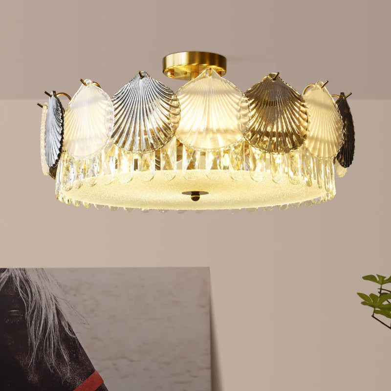 Maison Ornate French Modern chandelier with golden and clear crystal LED accents, elegantly illuminated.
