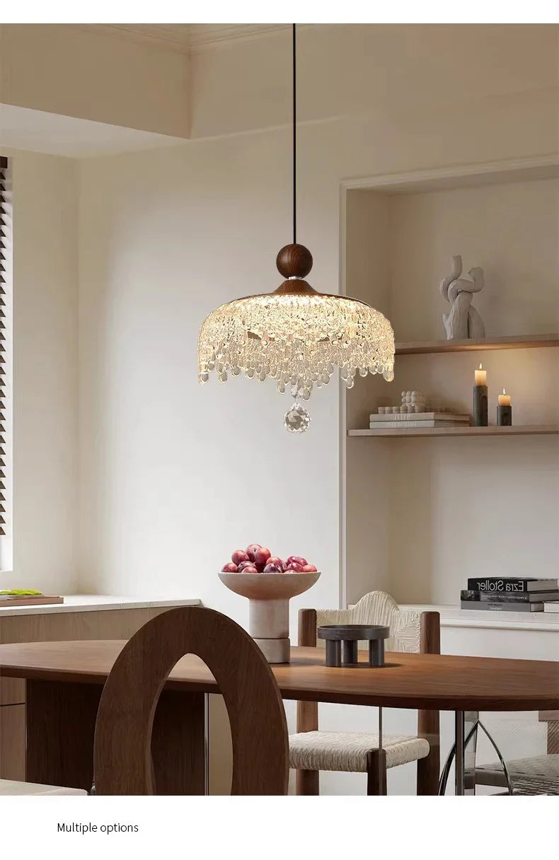 Maison Ornate French Medieval Style Crystal Teardrop Chandelier with intricate detailing and sparkling teardrop crystals.