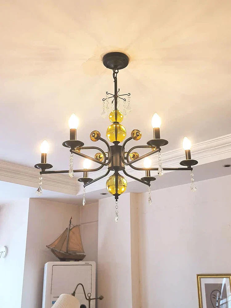 Maison Ornate Vintage Crystal Chandelier with yellow glass accents and hanging crystals, LED-lit.