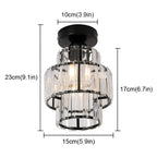 Art Deco chandelier with black base and cylindrical clear K9 crystal shades, modern pendant style.