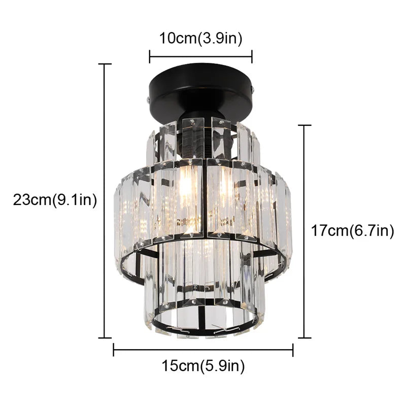Art Deco chandelier with black base and cylindrical clear K9 crystal shades, modern pendant style.