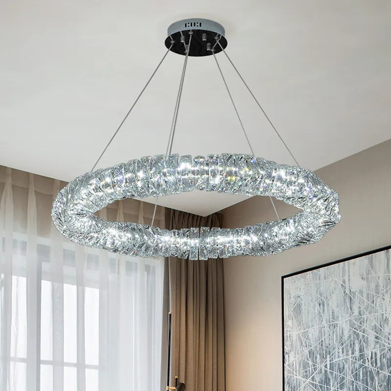 The Maison Ornate K9 Crystal Chandelier features modern suspension, remote control, and four support wires.