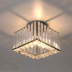 Maison Ornate Art Deco chandelier with adjustable lights, vertical crystal bars, and warm decorative glow.