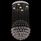 Polished steel chandelier with cascading modern crystal pendants, circular mount, and LED illumination.