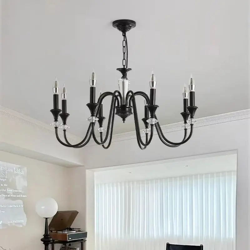 Maison Ornate Vintage Crystal Chandelier with eight candle-style lights, featuring retro elegance.