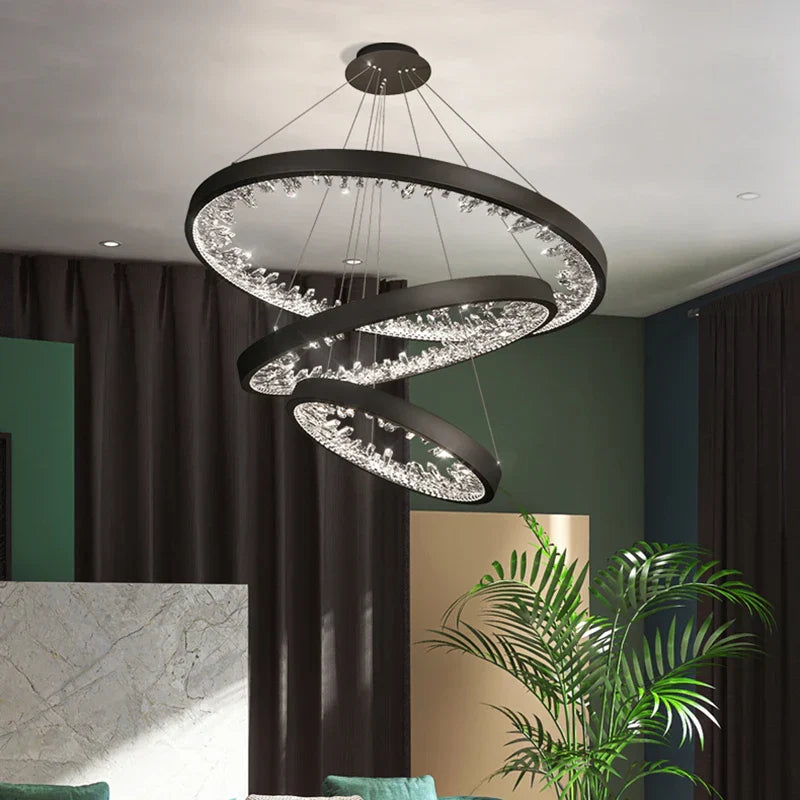 The Maison Ornate Modern Villa LED chandelier with three crystal-embellished rings suspended elegantly.